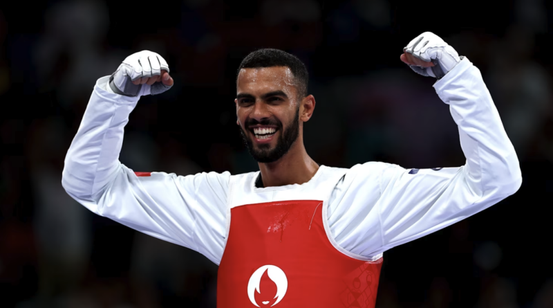 Tunisia as Katoussi won his gold medal